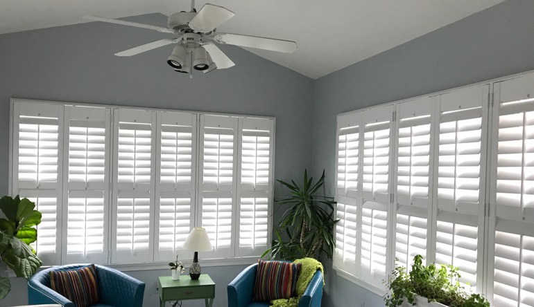 Cincinnati living room with fan and shutters